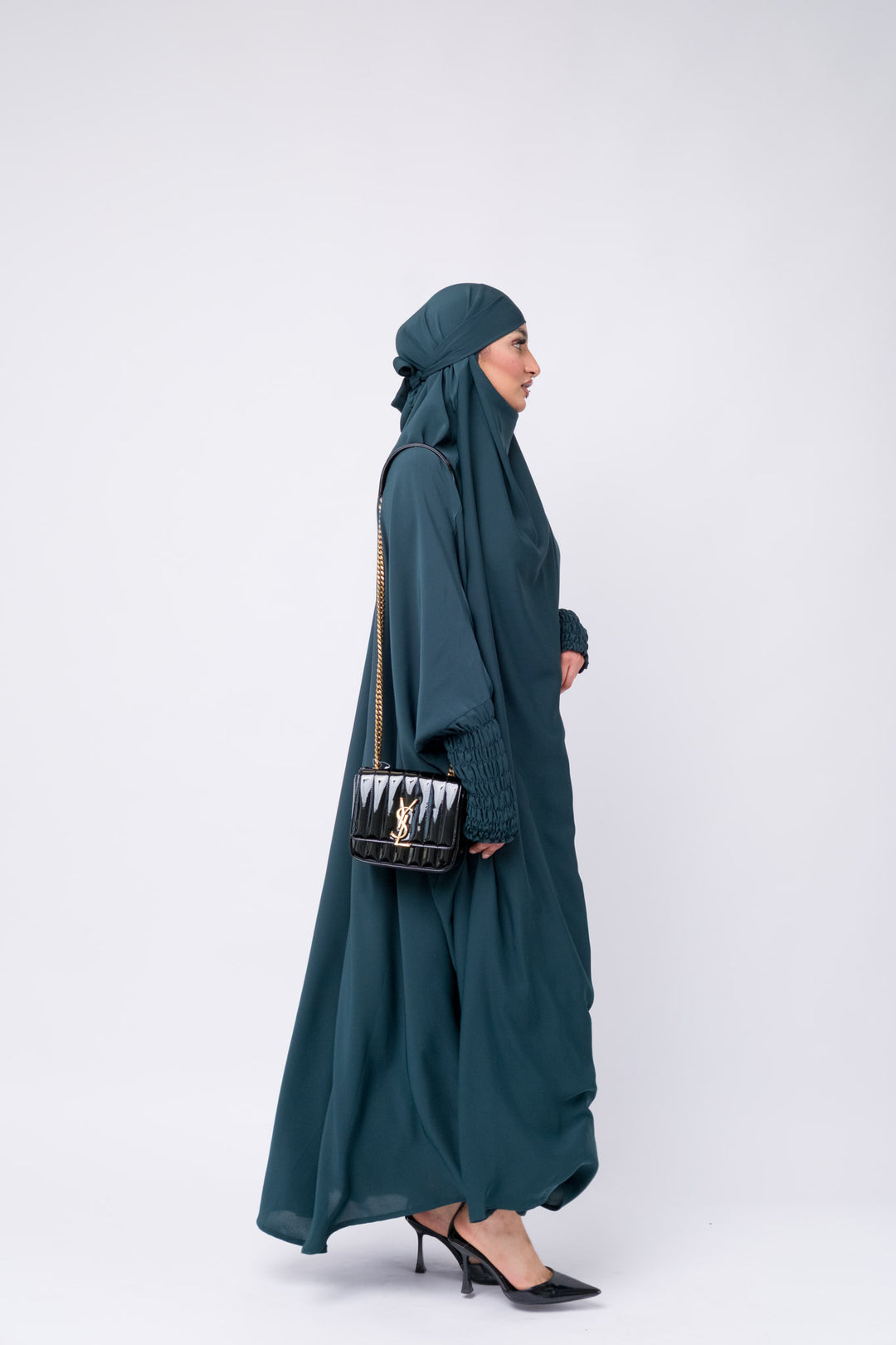 Full-length dark teal khimar with elegant gathered sleeve detail, Islamic clothing for hijab fashion.