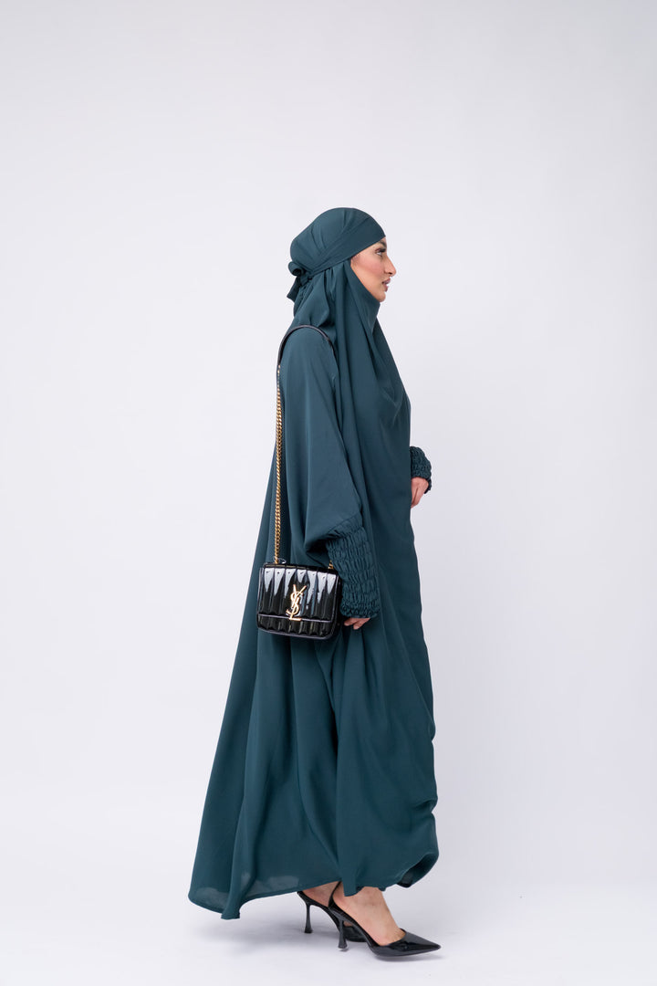 Full-length dark teal khimar with elegant gathered sleeve detail, Islamic clothing for hijab fashion.