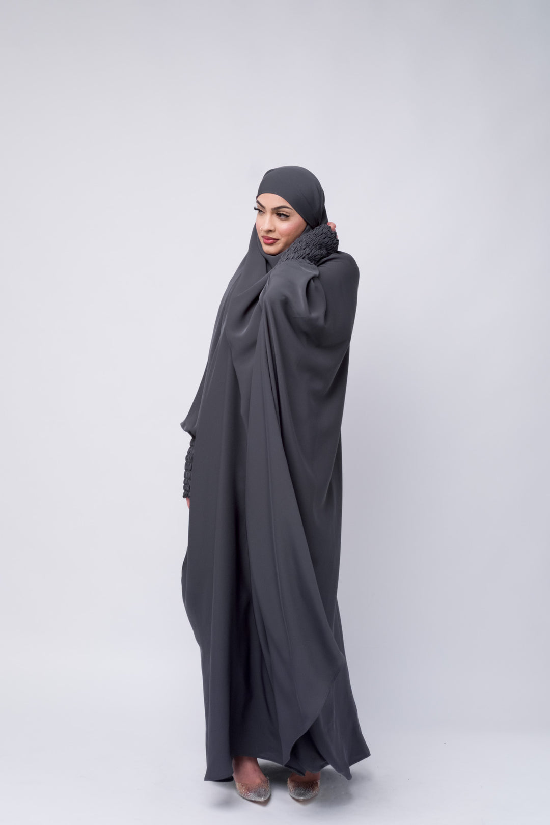 Elegant grey khimar with smocked sleeves for Muslim women, full coverage Islamic prayer outfit.