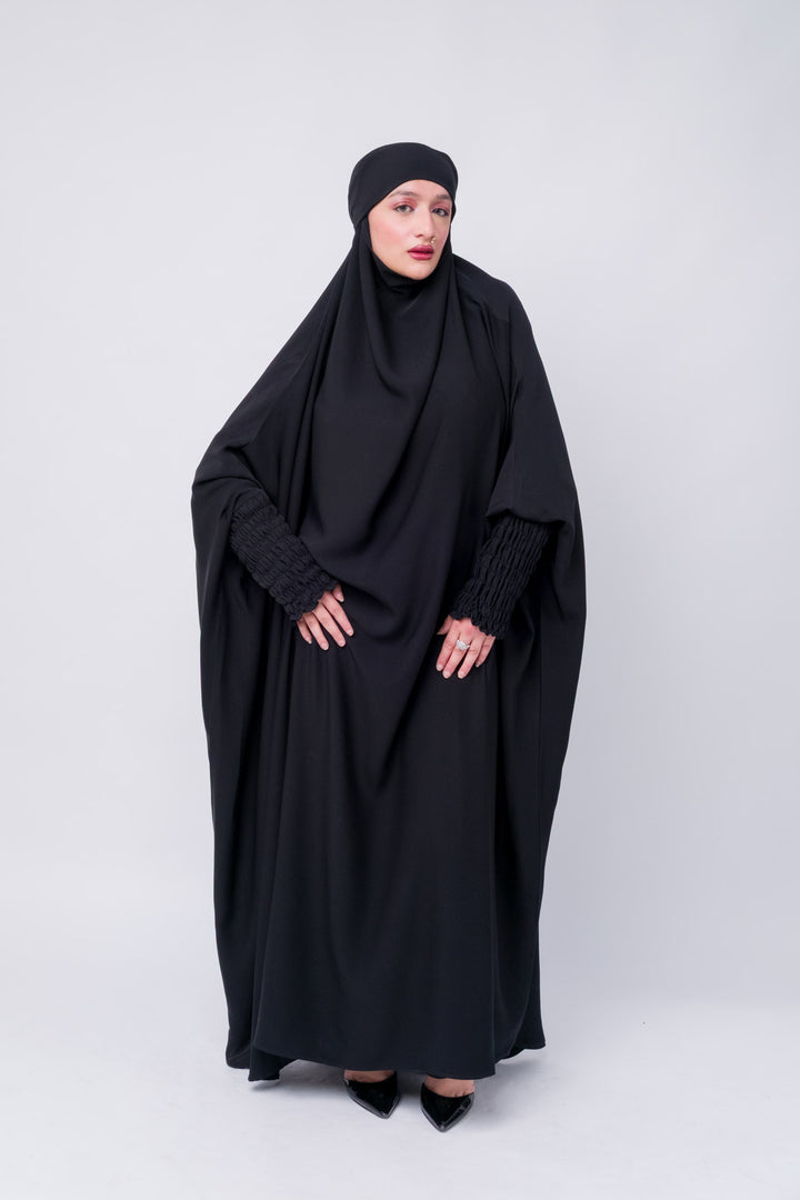 Modest black khimar abaya for women, featuring comfort fit and stylish ruched sleeve detail.