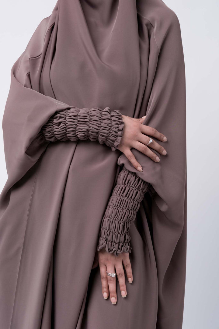 Stylish khimar abaya for women in modest taupe, perfect for everyday hijab outfit and salat.