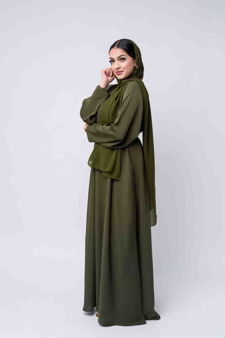 Full-length modest olive abaya with belt, soft fabric and perfect for Eid or prayer. 