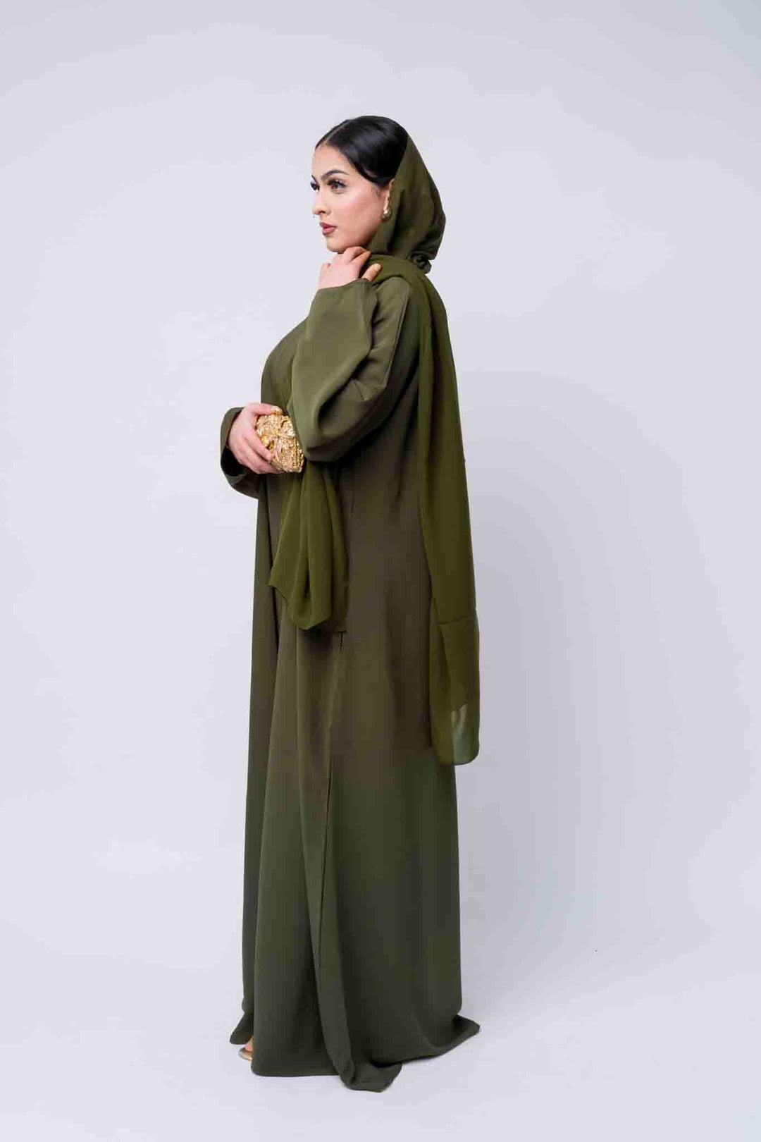 Long sleeve olive abaya dress with soft fabric, classic and stylish modest wear. 