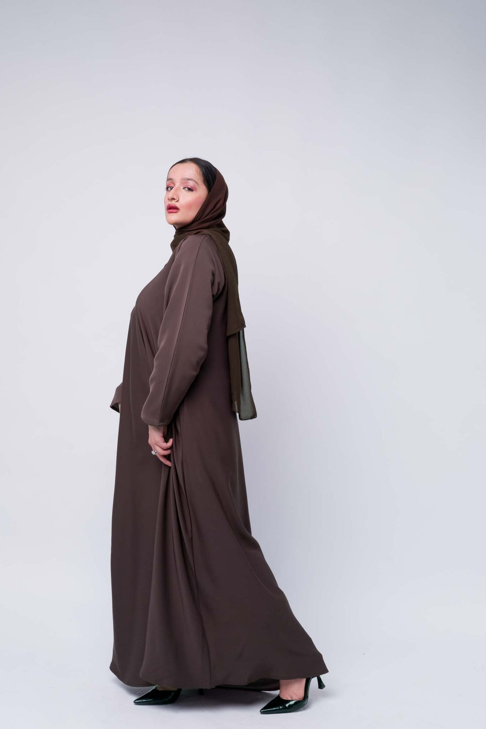Flowy chocolate brown abaya with matching hijab, modest fashion for Muslim women. 