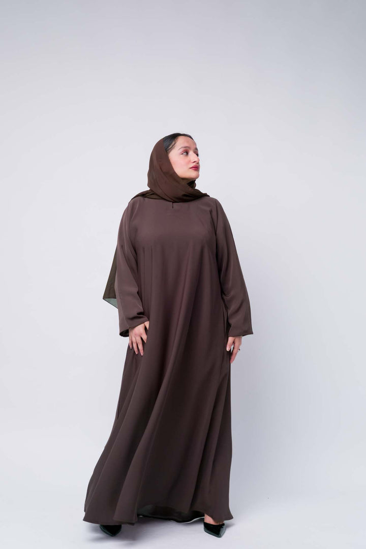 Dark brown abaya with full sleeves and hijab, flowy fabric perfect for every season.