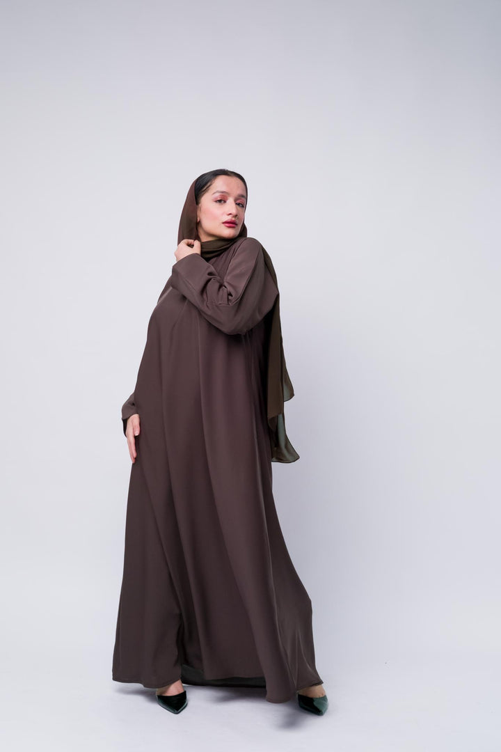Elegant brown abaya with hijab for women, modest Islamic dress perfect for prayer and everyday wear.