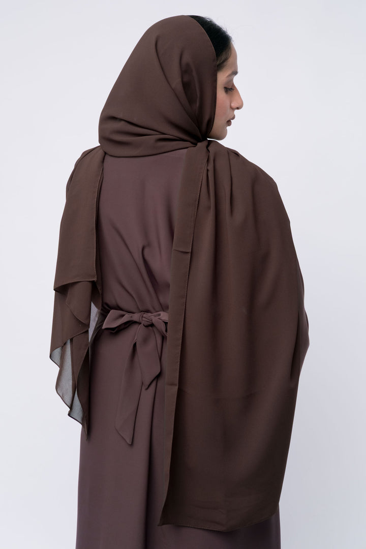 Simple and elegant brown abaya set for women, modest wear ideal for Ramadan or formal use.