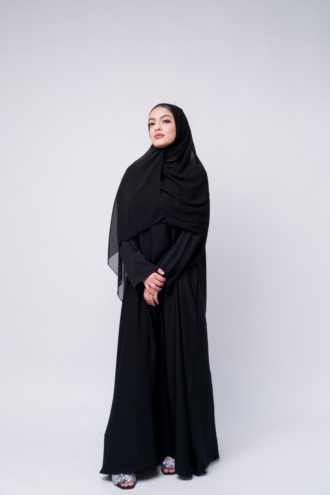 Elegant black abaya with hijab for women, perfect modest wear for Eid, prayer, or daily Islamic clothing. 