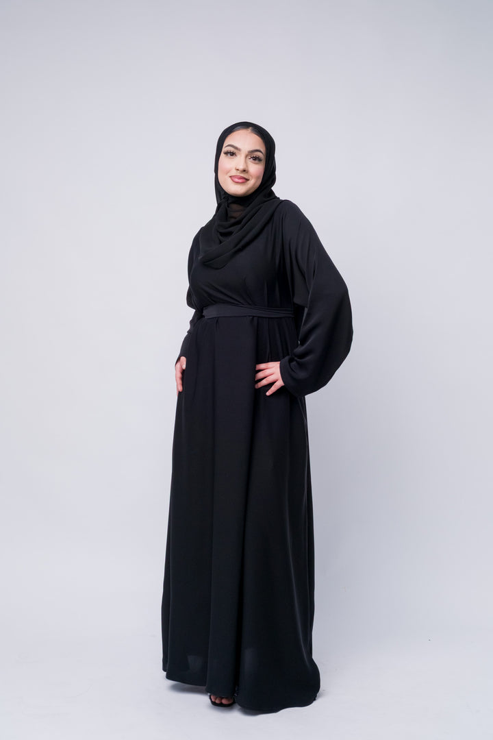 Black abaya dress with matching chiffon hijab, ideal for modest occasions and Islamic wear staples.