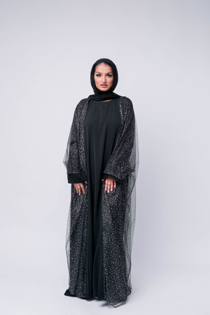 Chic black abaya dress with sequin shimmer – Muslim women’s outfit 