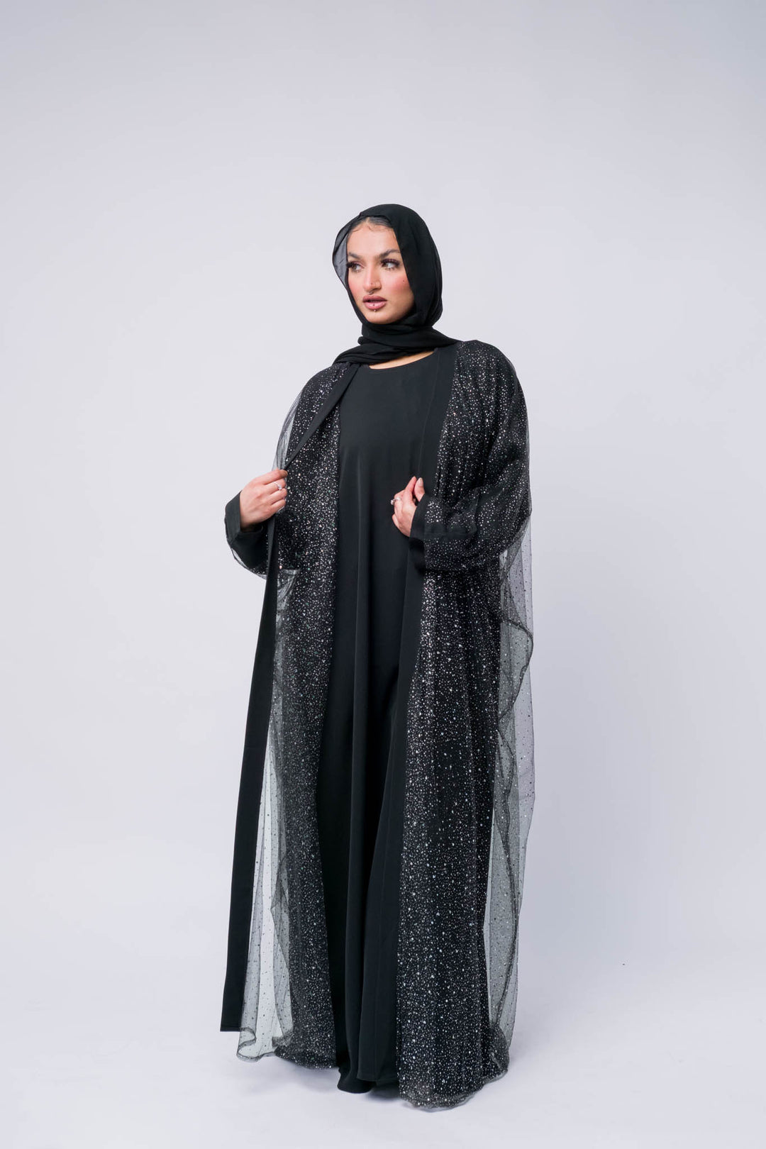 Modest black abaya with sparkle overlay – hijab fashion look