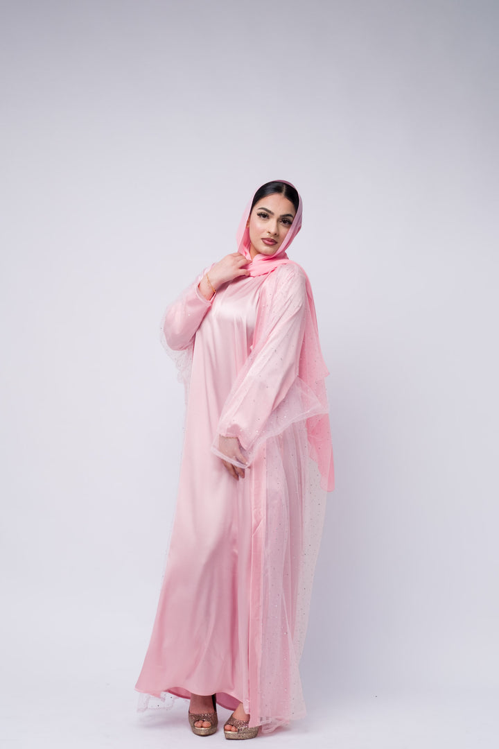 Crystal-detailed pink abaya with lightweight fabric and matching hijab for modern modest fashion