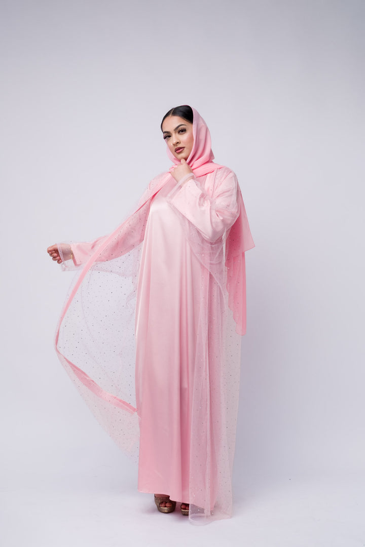 Stylish pink abaya with flowy satin inner and sparkly chiffon outer, perfect for Ramadan nights