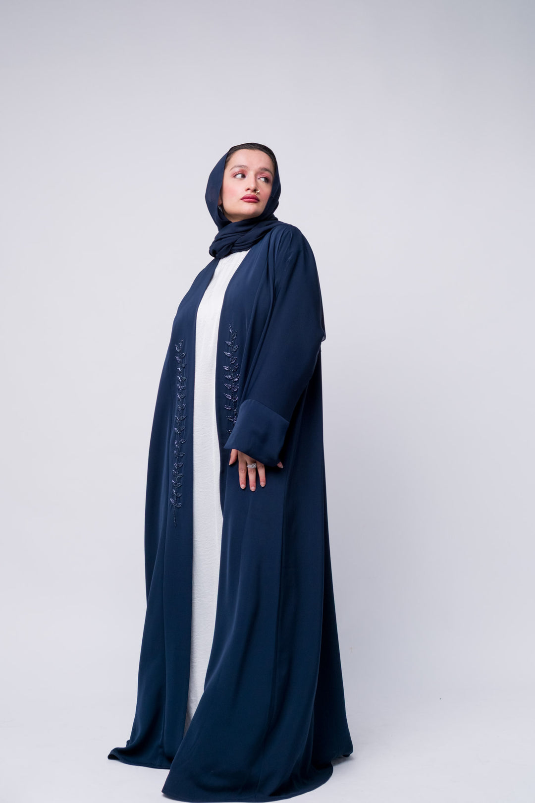 Classic navy abaya with front open style and embroidery, ideal for Eid and Ramadan. 