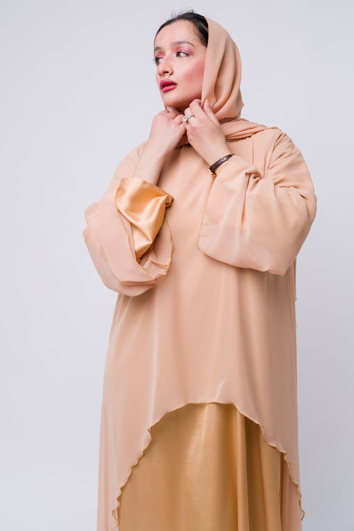  Modest wear abaya in peach with satin and chiffon layers, soft flowy silhouette for