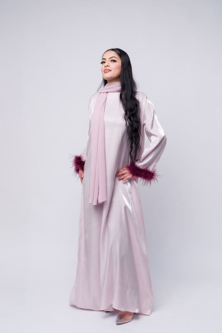 Stylish lilac abaya with purple feather details, luxury modest fashion, formal Islamic clothing.