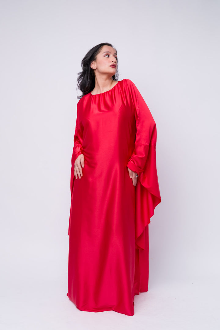 Shiny red silk-like kaftan for women – perfect for Ramadan or festive events 