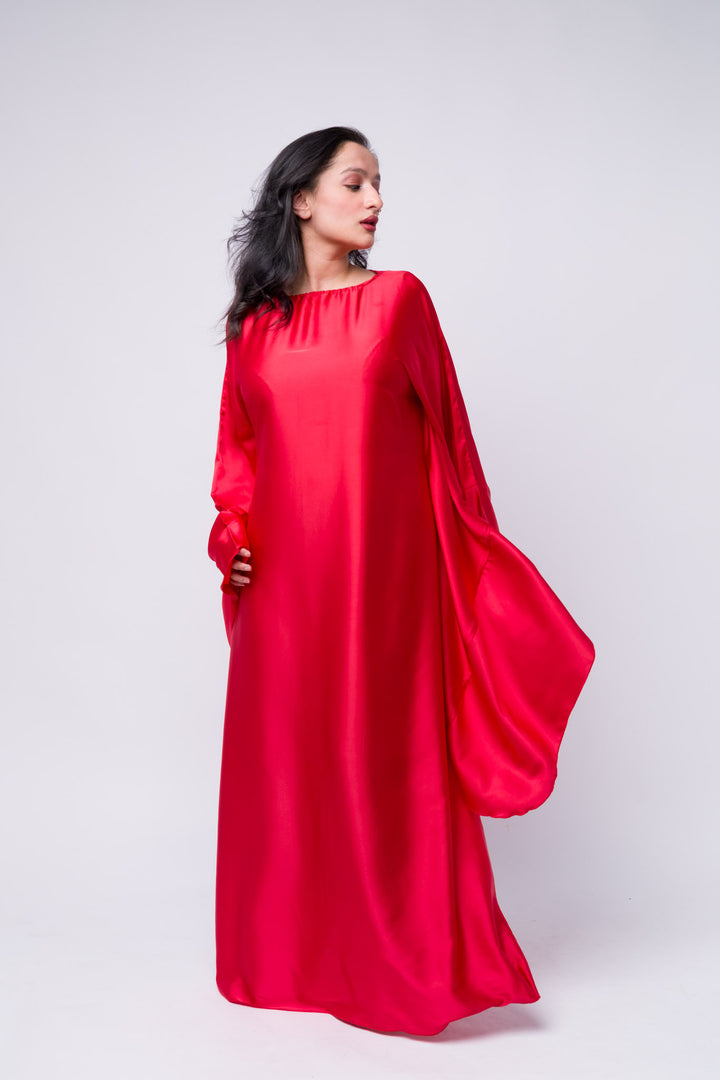 Vibrant red modest dress with batwing sleeves – perfect for special occasions 