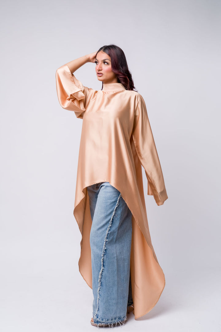 Peach high-low satin top with wide-leg denim pants – modest chic outfit