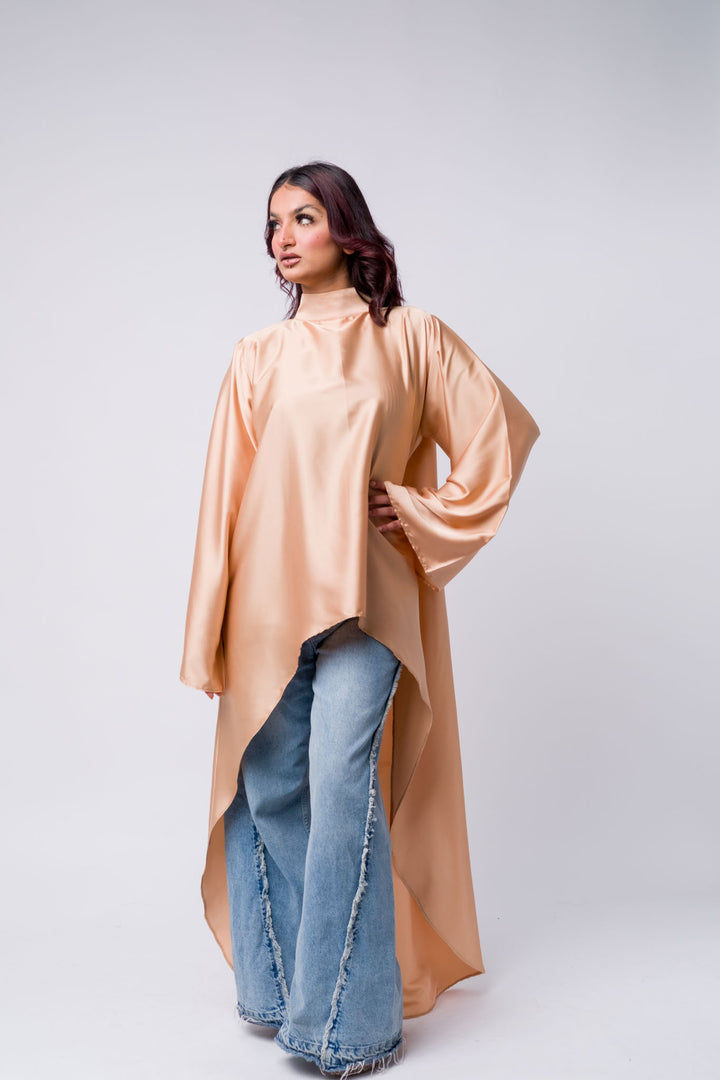 Stylish peach satin high-neck top with blue denim flares – modest wear
