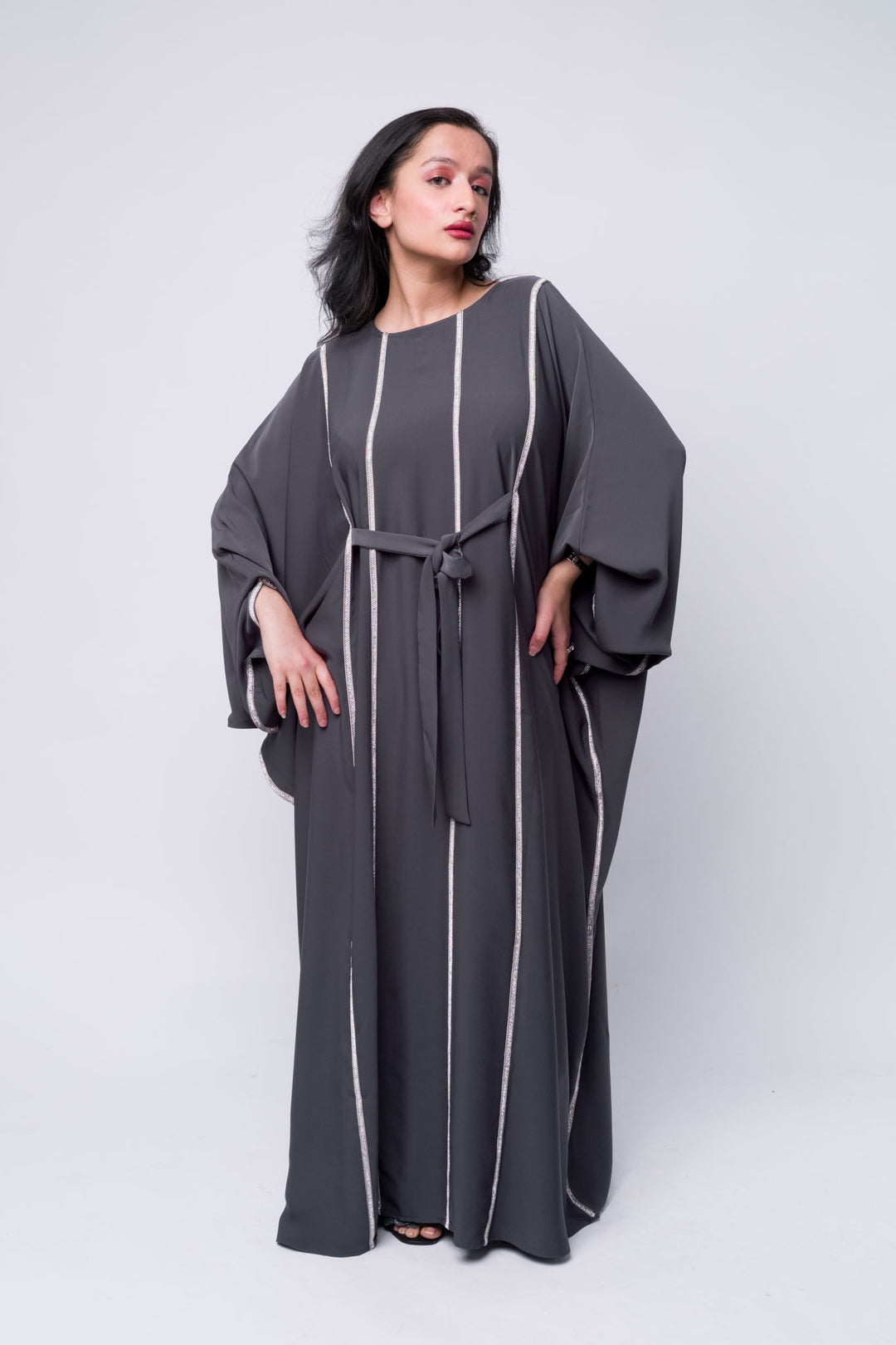 Stylish grey embellished abaya dress for women, perfect for modest fashion and special events.