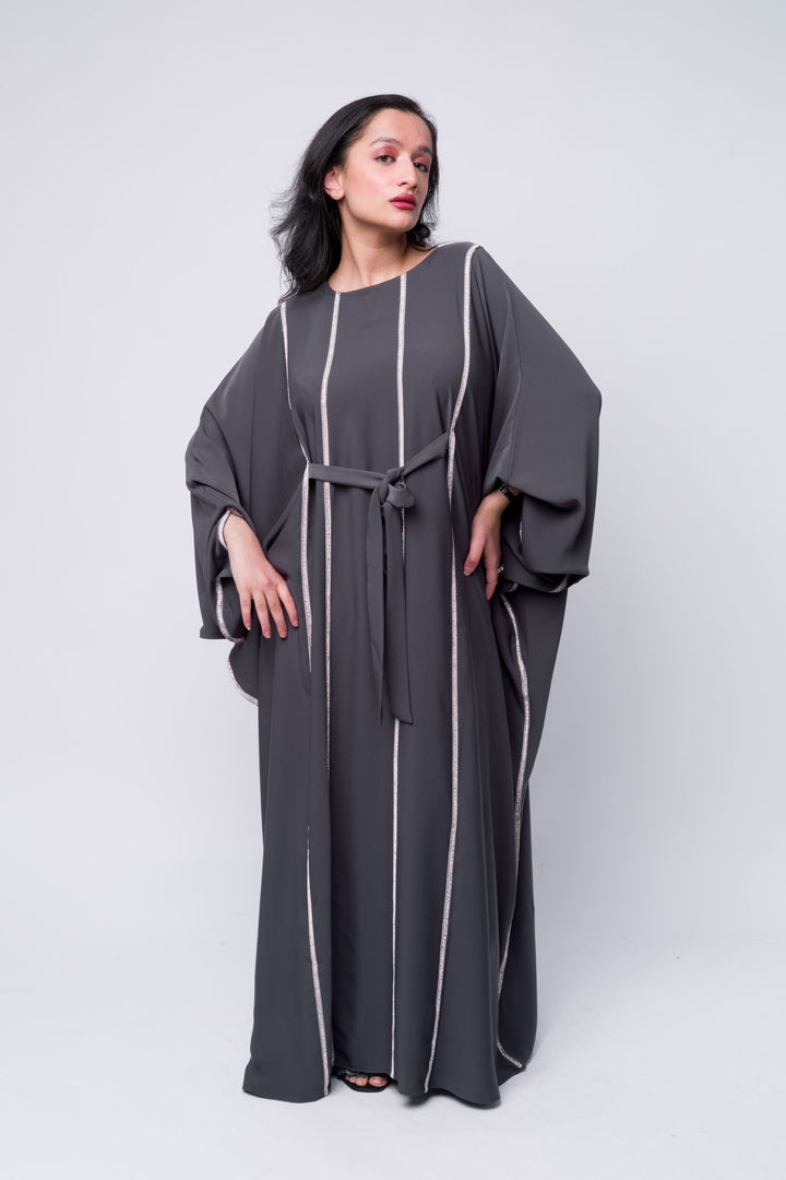 Stylish grey embellished abaya dress for women, perfect for modest fashion and special events.