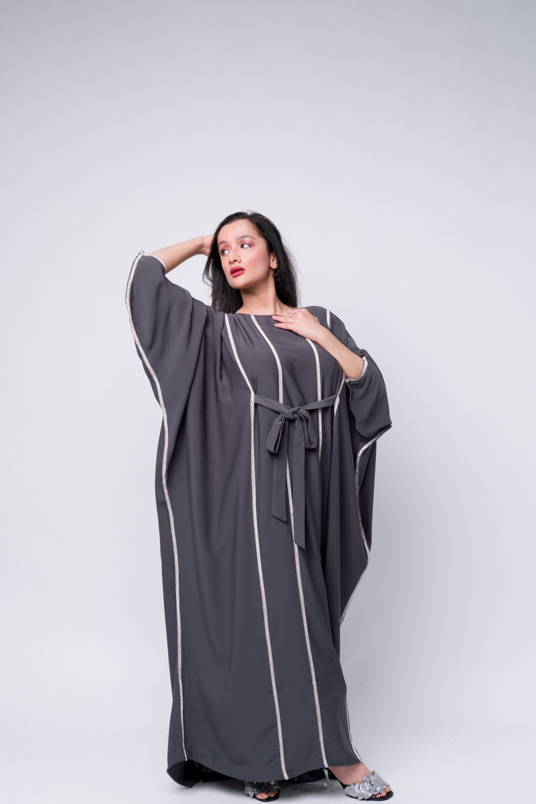 Elegant grey embellished abaya with belt, modest fashion for women – modern Islamic wear.