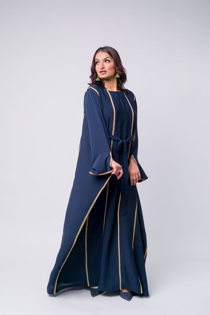 Navy formal kaftan with gold detailing, flattering flowy dress for parties and special occasions.