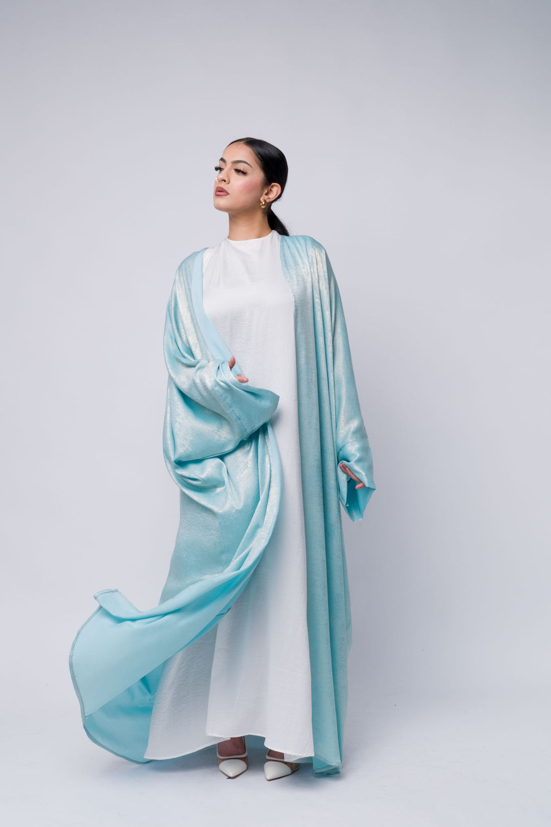 Shiny sky blue abaya with draped sleeves, modest and chic occasion outfit