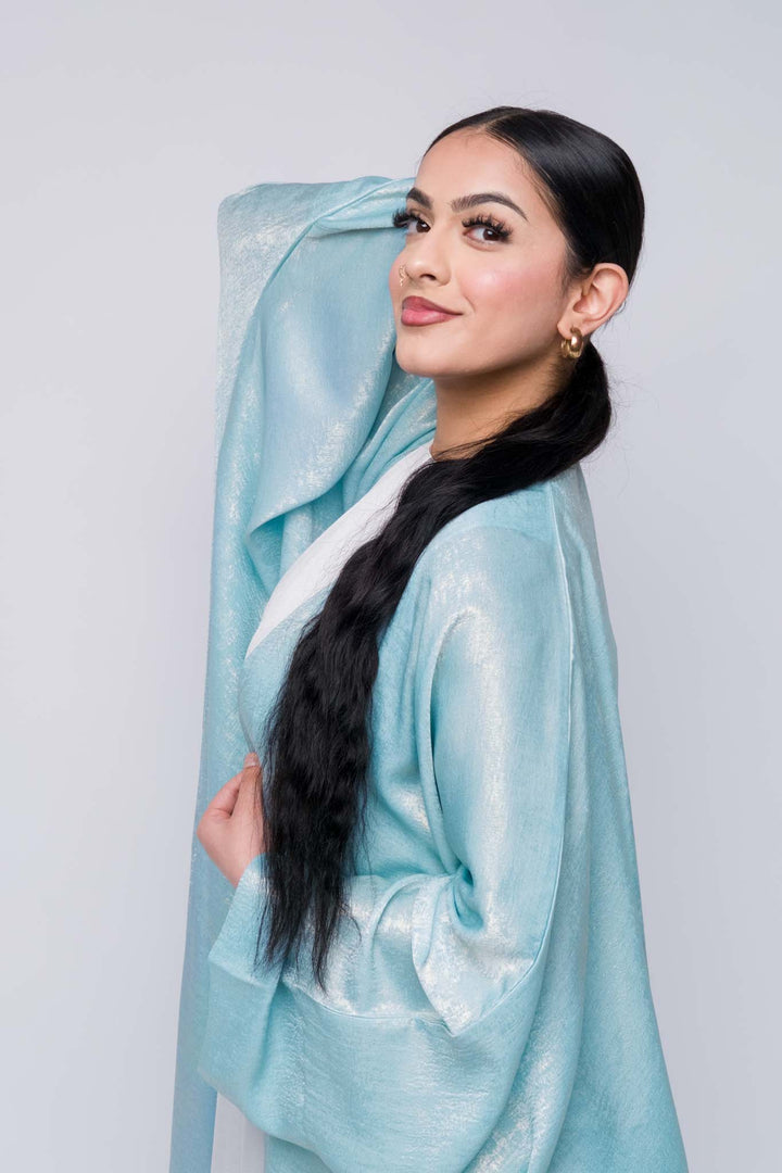Glossy finish blue farasha abaya for modest fashion lovers, perfect for Ramadan or Eid 