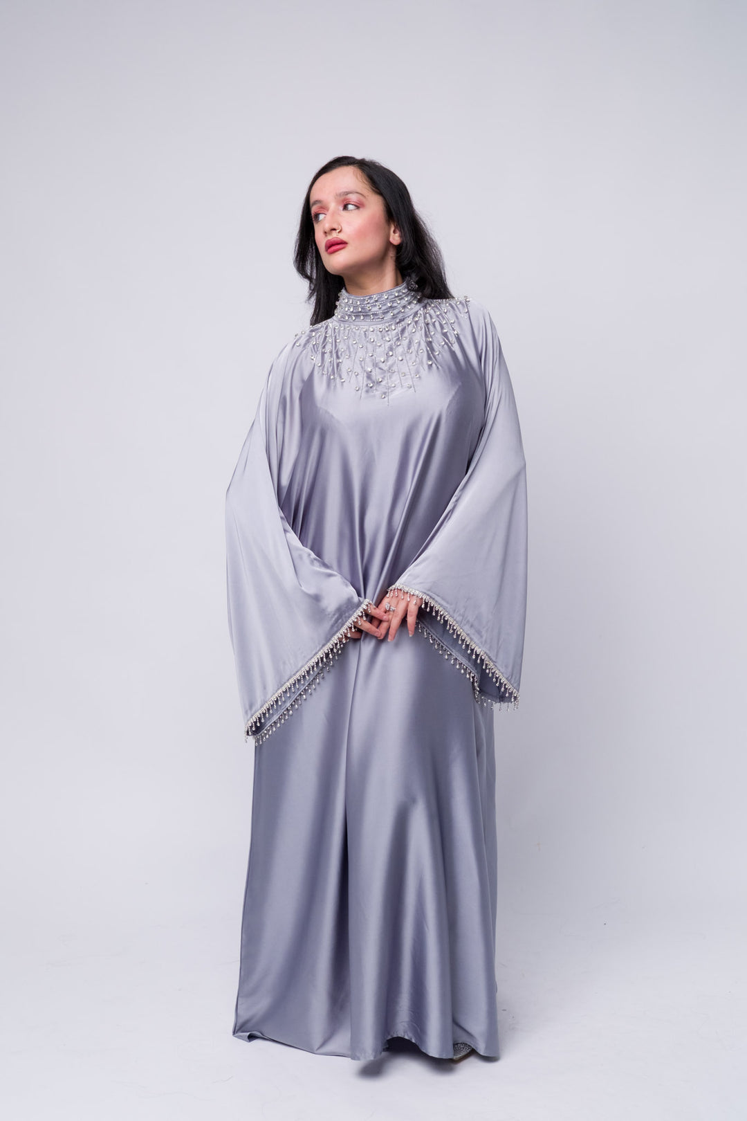 Modest grey abaya with pearl embellishments – Islamic fashion outfit for formal occasions sleeves.