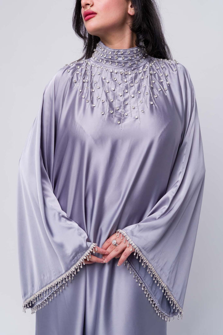 Women’s satin abaya in grey with pearl details – modest party wear or Eid outfit sleeves.
