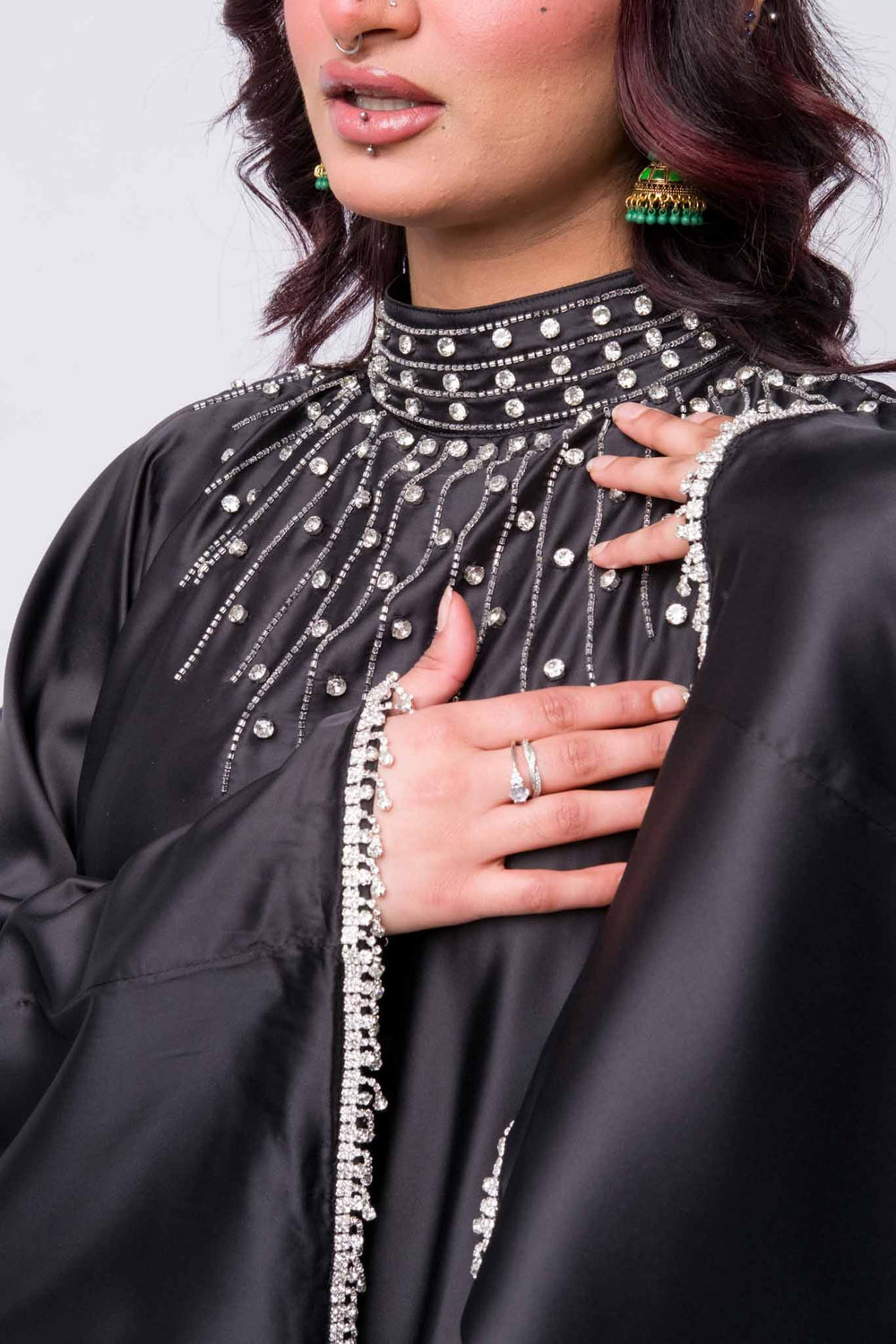 Satin black abaya with pearl and bead details – perfect for Eid, weddings, or evening wear