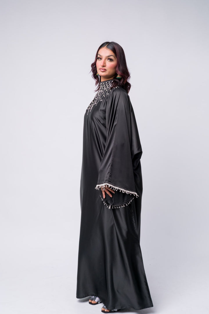 High neck black abaya with intricate beading – modest fashion for festive occasions 