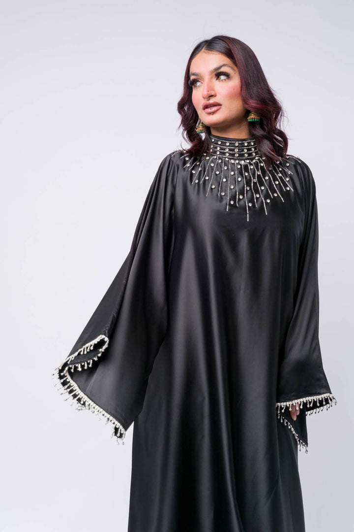 Glamorous black satin abaya with pearls – ideal modest outfit for Eid or special nights