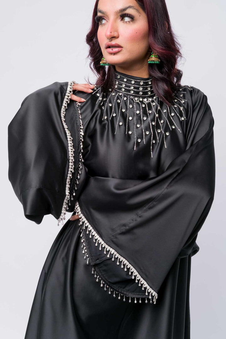 Black abaya with detailed embellishments – luxury Islamic wear for elegant events