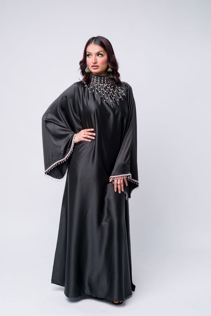 Satin embellished black abaya – modest fashion piece for formal or cultural occasions sleeves.