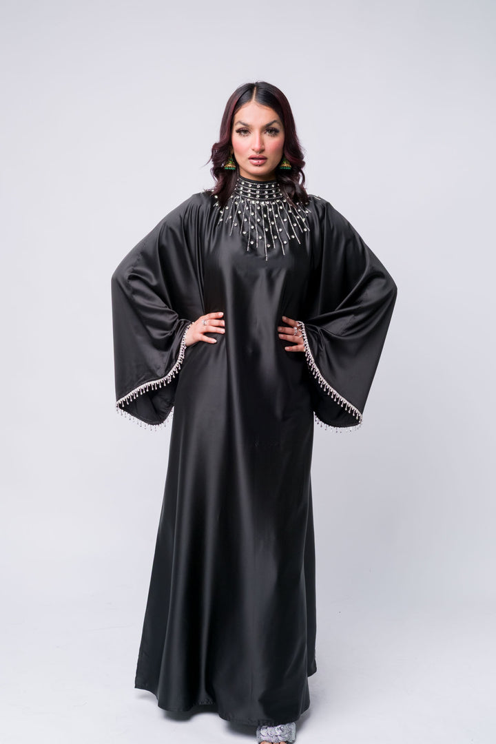 Modest luxury abaya in black with pearl accents – formal Islamic wear for women
