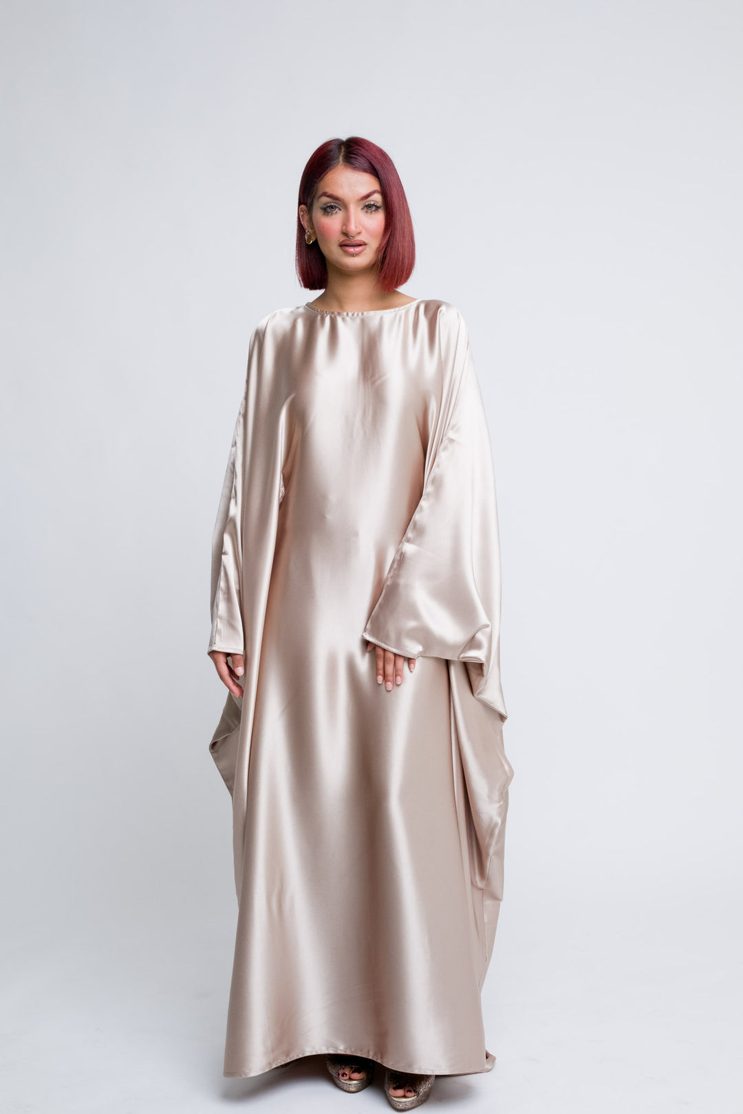 Luxury satin abaya in flowing champagne blush fabric