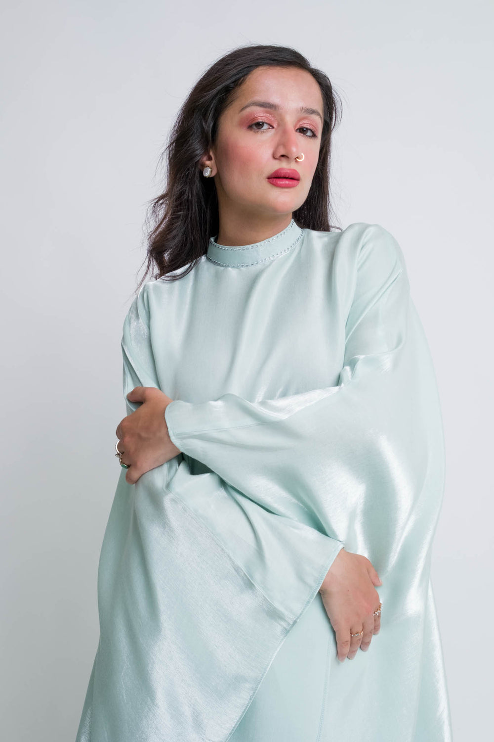 Icy pistachio kaftan with rhinestone collar and soft shine