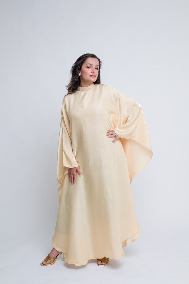 Modest kaftan dress in soft champagne hue