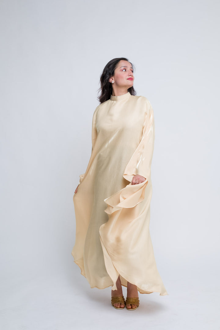 Elegant flowy abaya-style kaftan in champagne blush
