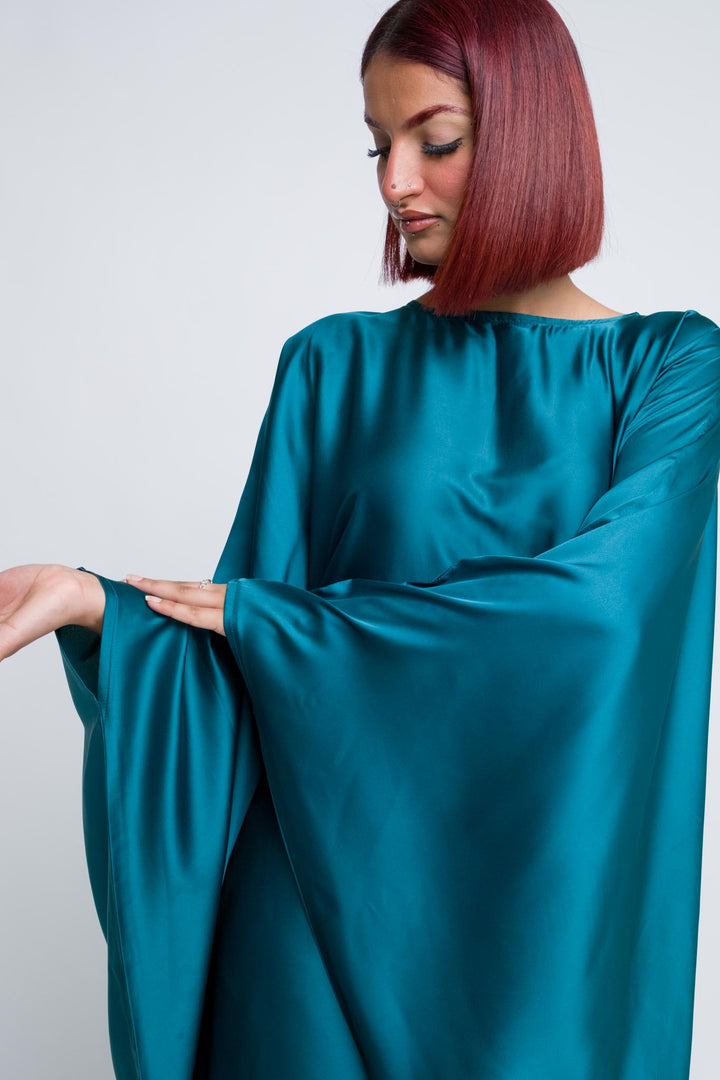 Elegant teal abaya with soft drape and invisible belt