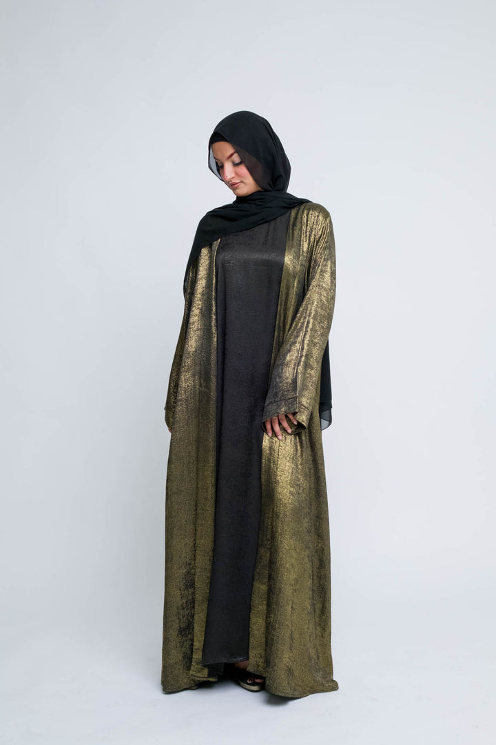 Glossy gold abaya with matching accessories for women