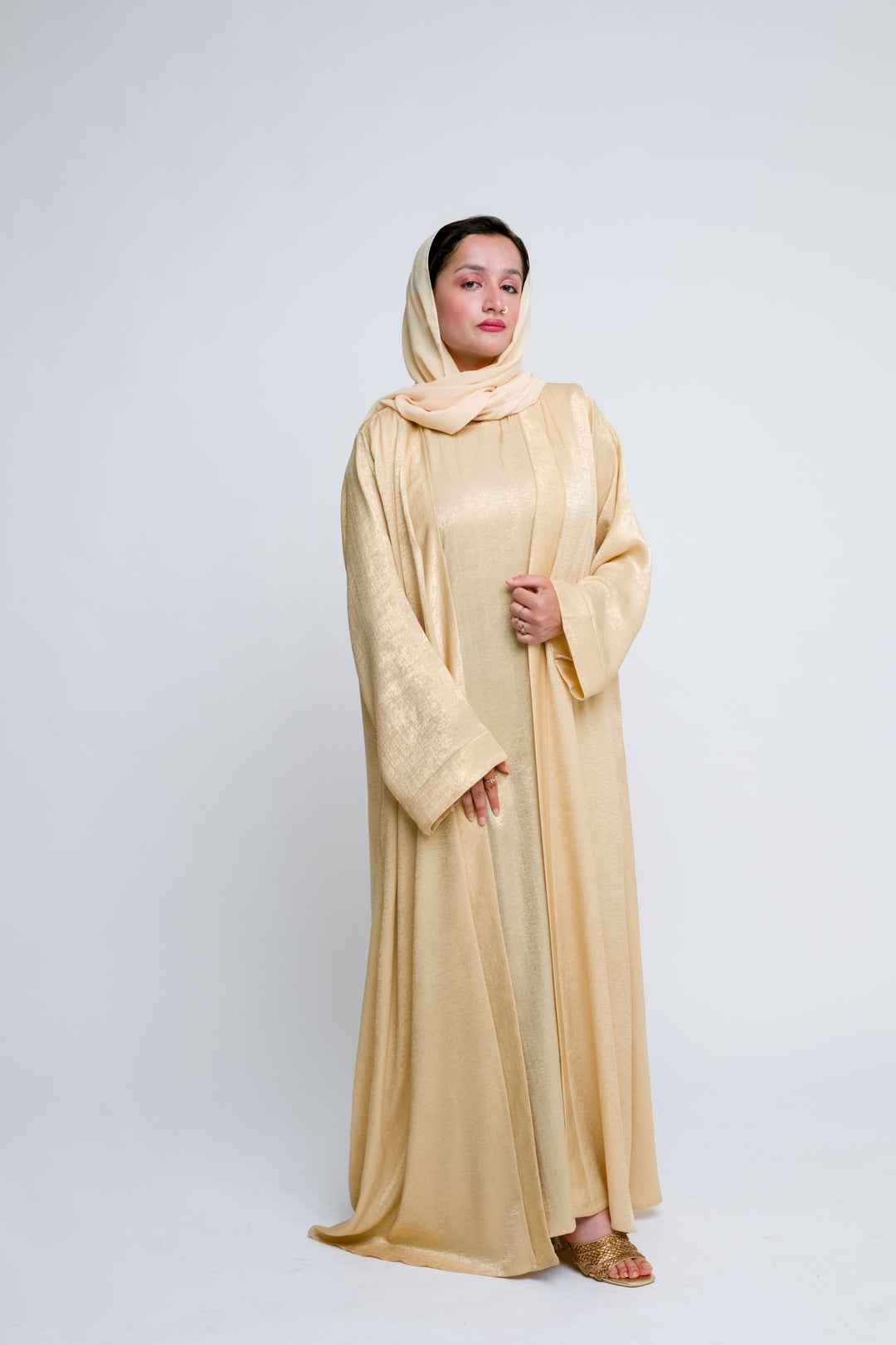 Luxurious four piece abaya with soft shimmer finish