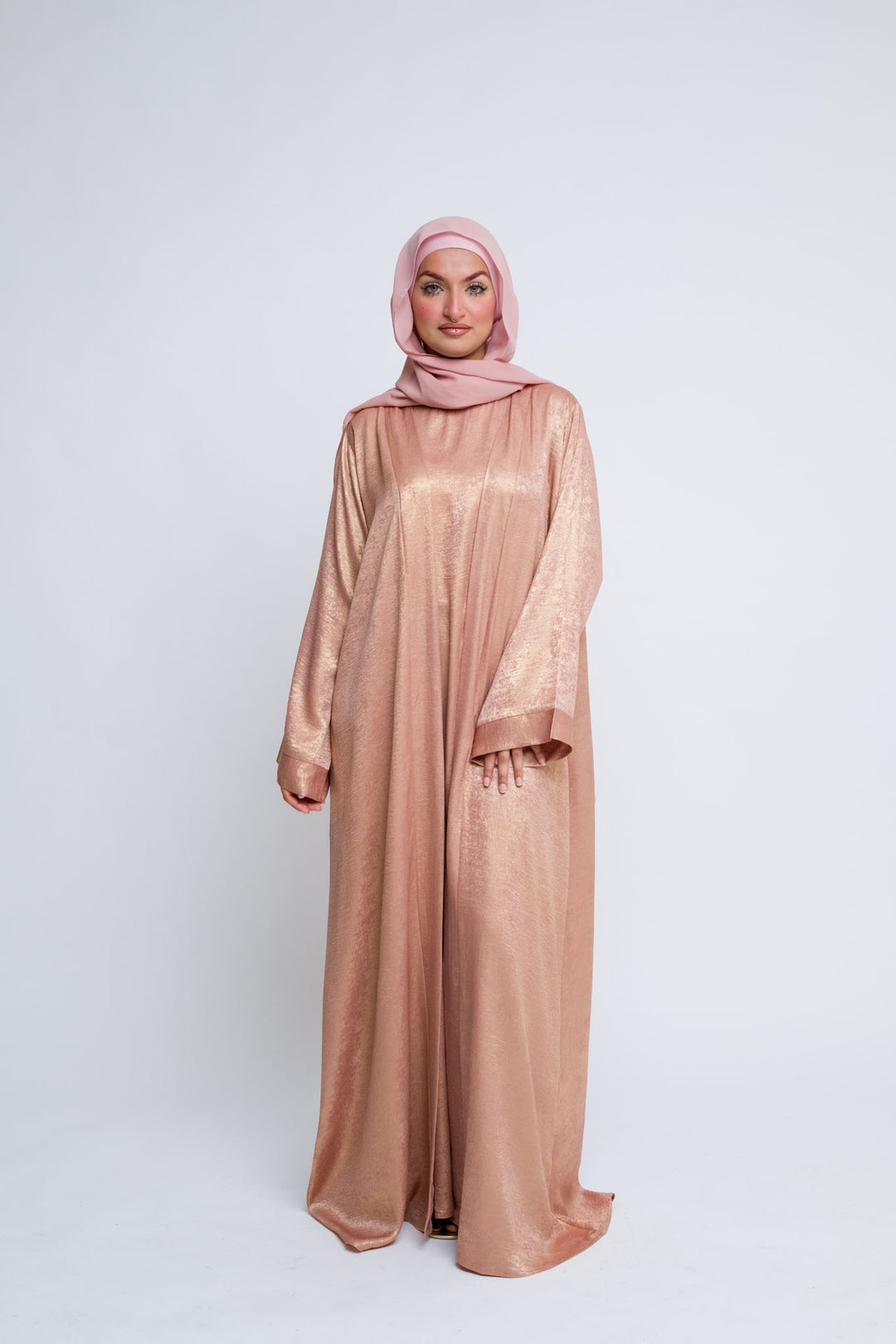 Rose gold abaya set with matching hijab and slip dress