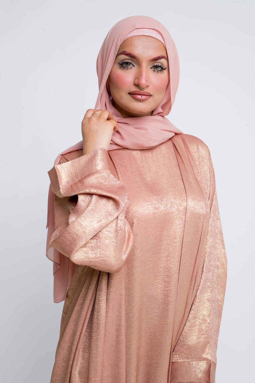 Rose gold modest outfit with elegant layered details