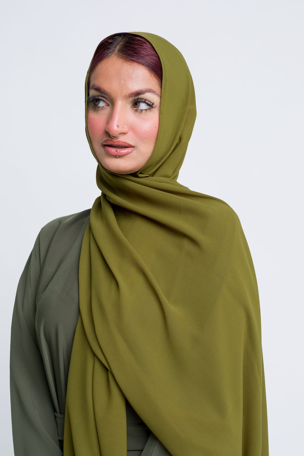 Premium chiffon hijab in sage tone for breathable, modest fashion.