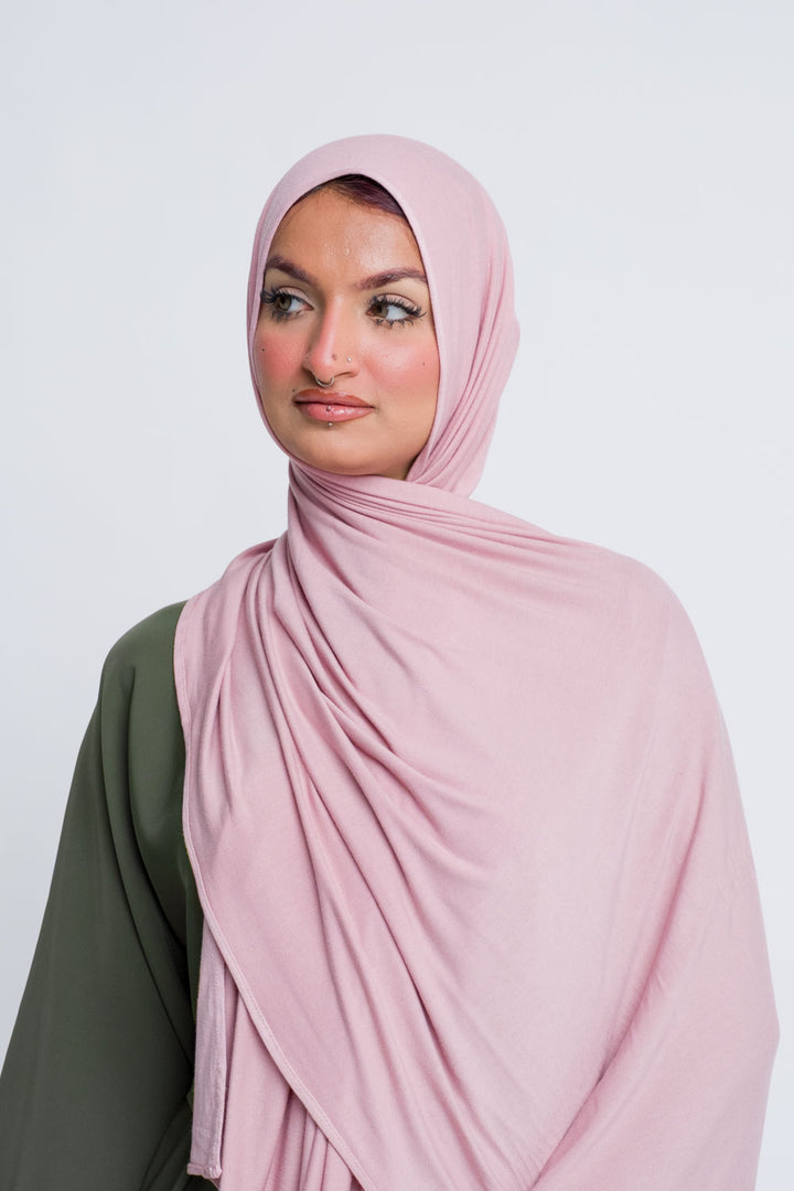 Soft pink jersey hijab for everyday modest wear, stretchy and pin free.