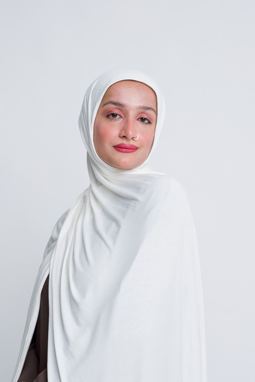 Soft white hijab for Muslim women, perfect for daily modest wear.